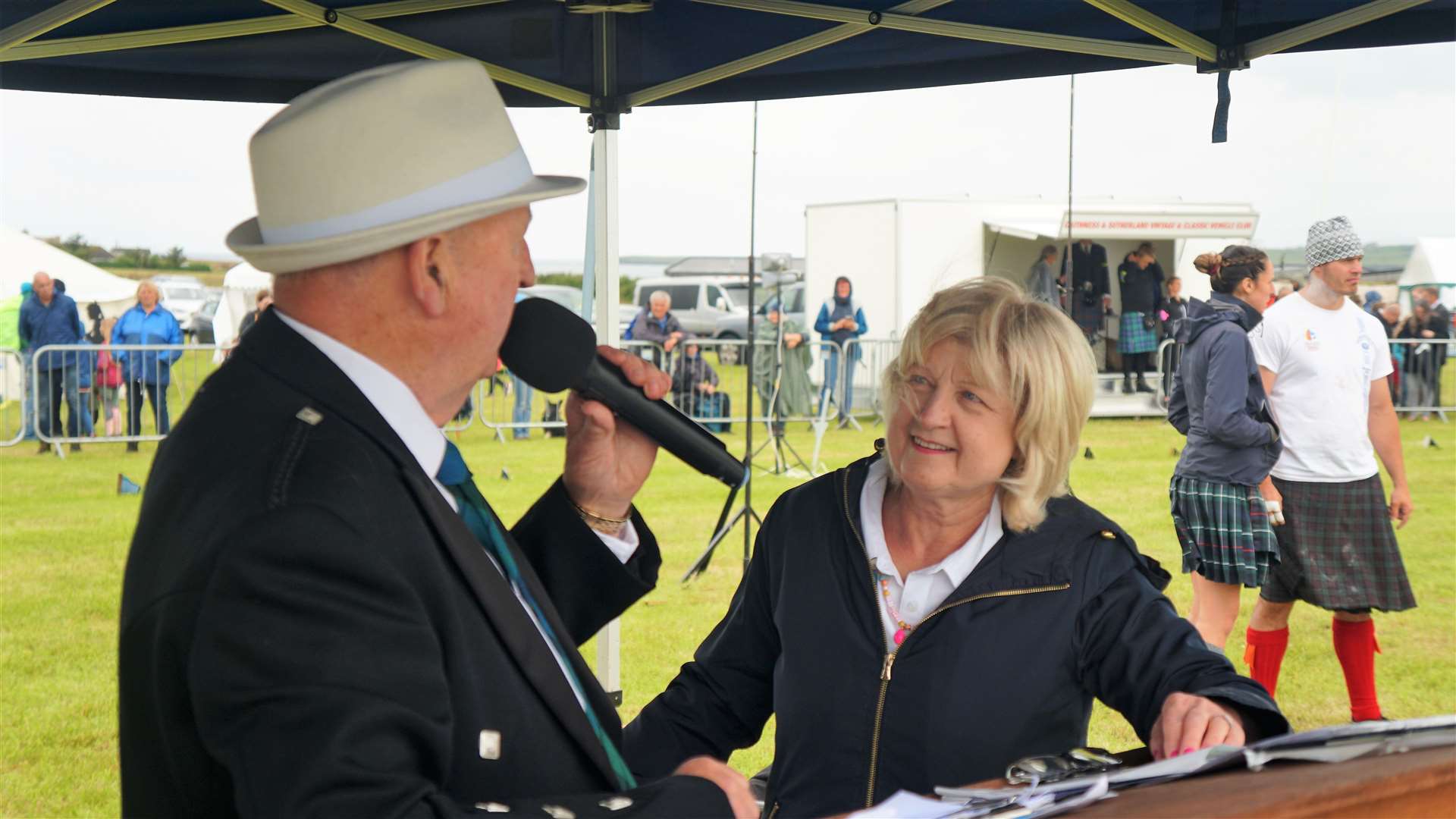 Compere Willie Mackay with his wife Glynis at Mey Highland Games 2022. Picture: DGS