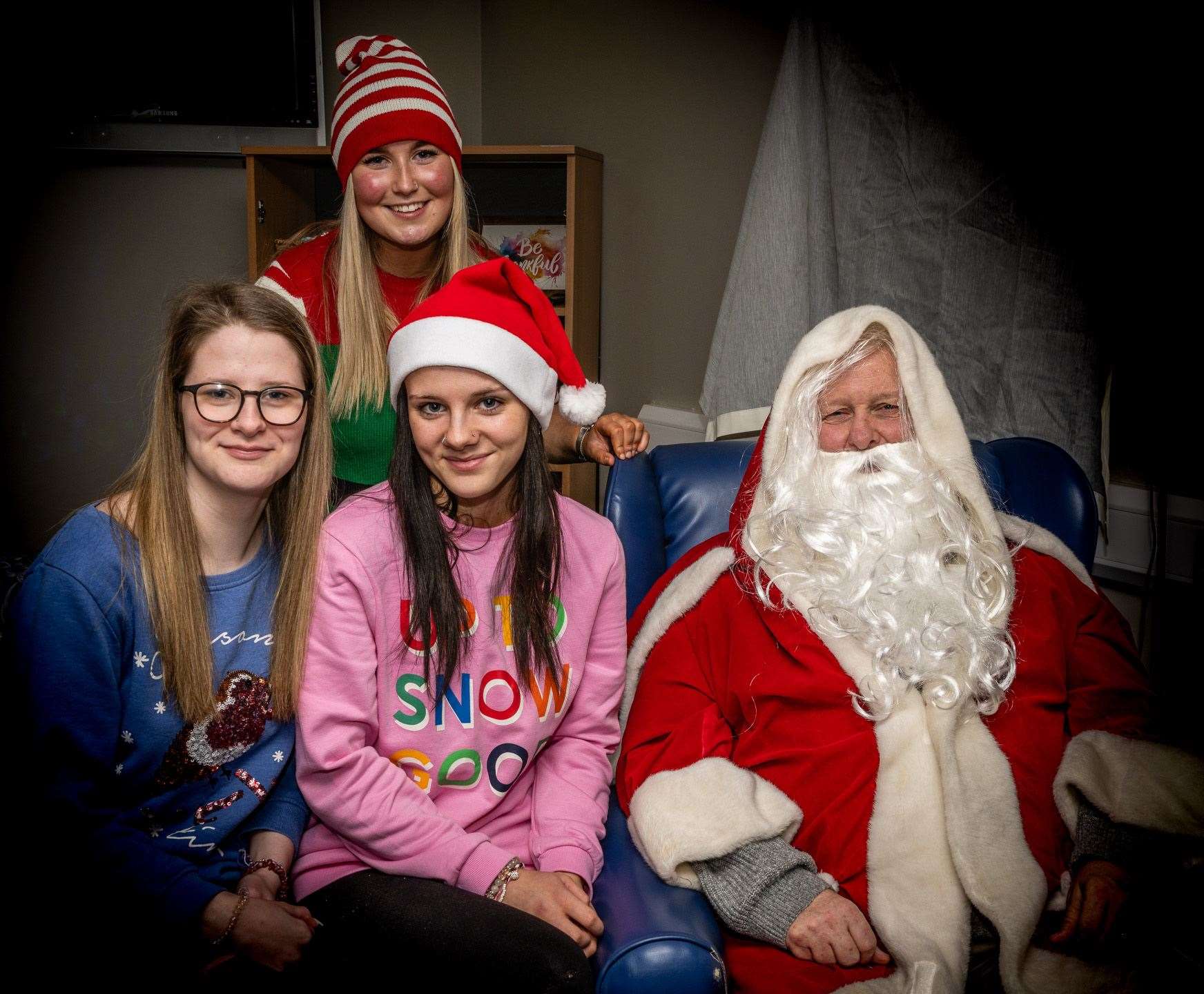 Santa was in his grotto at Dornoch Academy on Saturday afternoon and was helped by Katie O'Donnell, Lucy MacLennan and Emma Sutherland. Picture: Andy Kirby