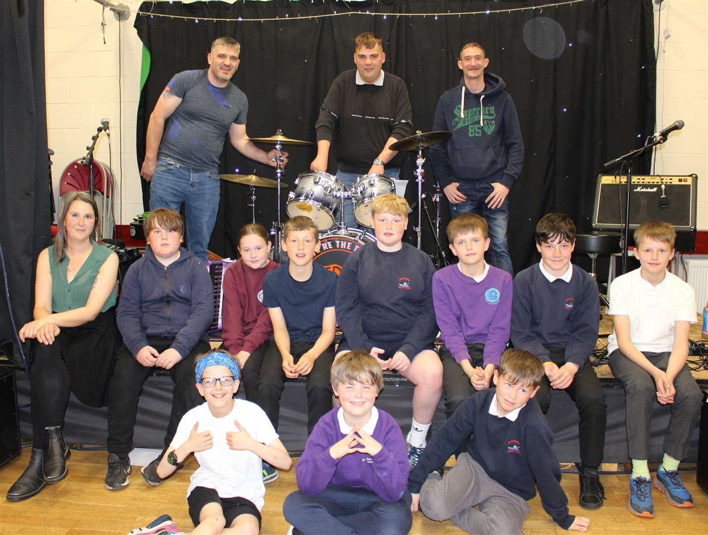The band stayed after the concert to pose for photographs, sign autographs and chat to pupils and staff.