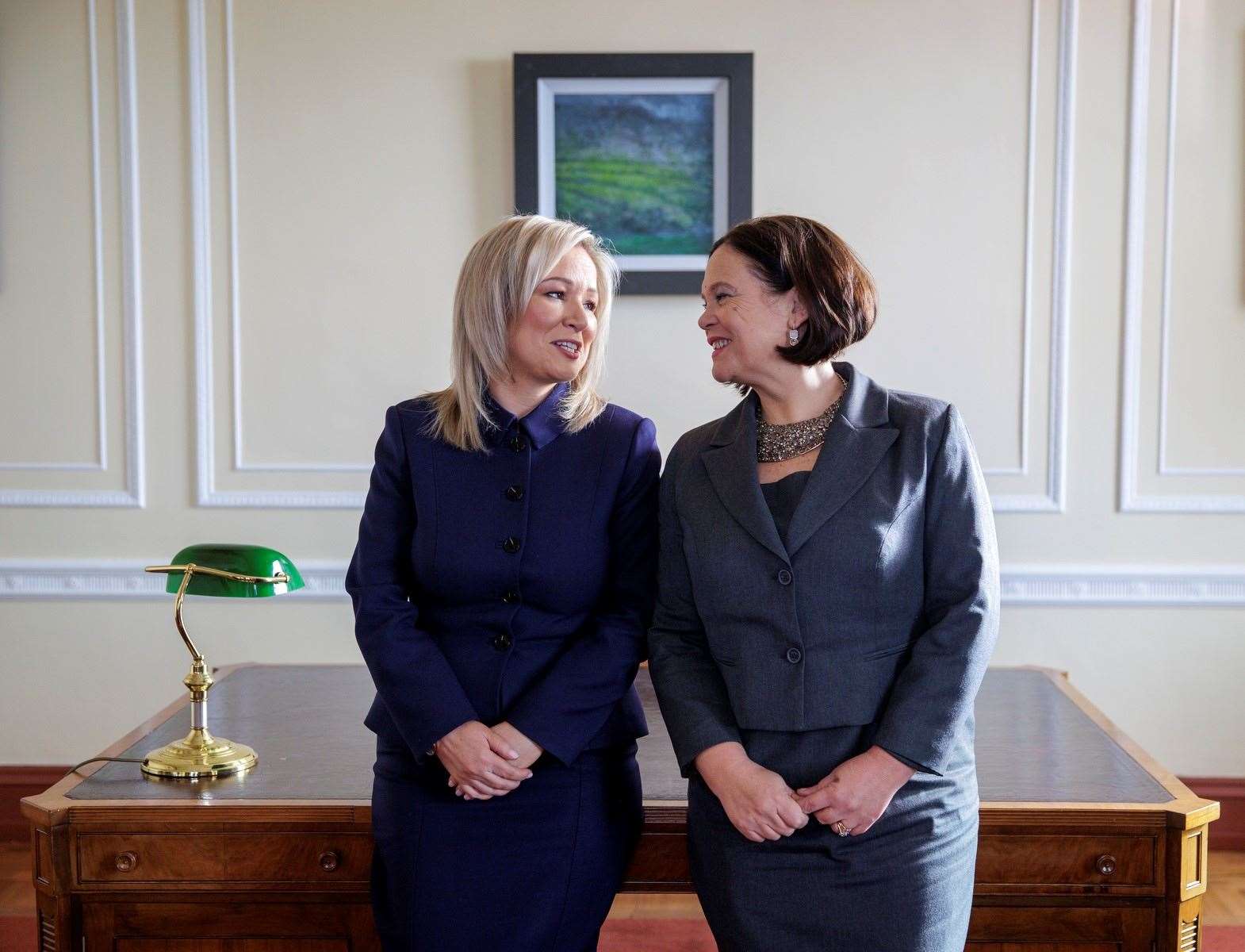 Michelle O’Neill, left, with Mary Lou McDonald in the First Minister’s office at Stormont (Liam McBurney/PA)