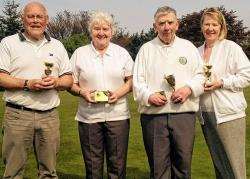 Brora Bowling Club's Ida Robertson two-bowl pairs winners, Irene Smith and Harry Hastings (centre) with runners-up Paul Hollingworth and Lillian Wallwork.