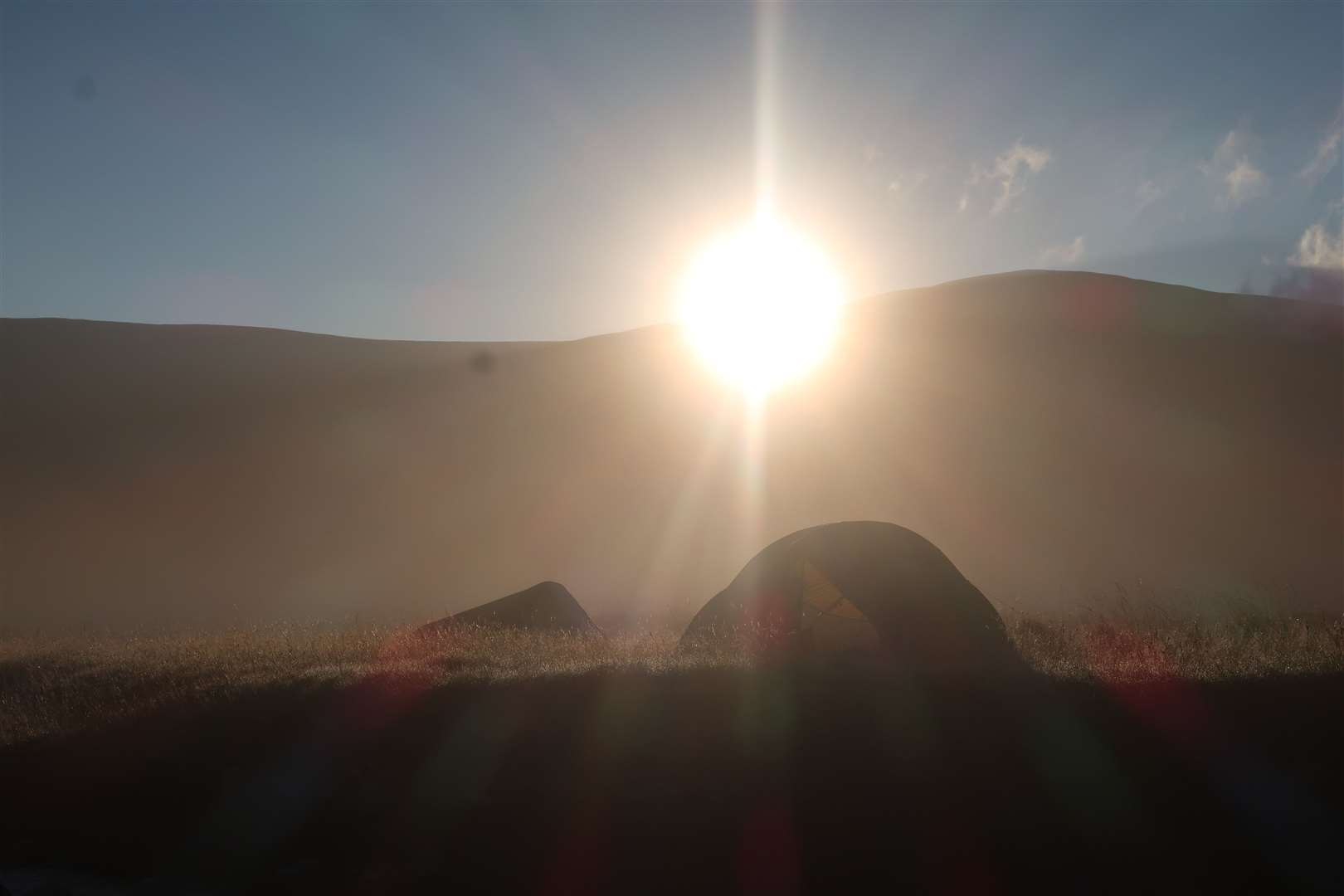 A glorious sunrise over the leaders’ tents during a Duke of Edinburgh expedition.