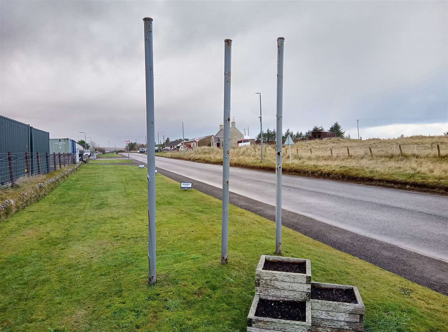 Old poles, bent and rusting, on the eastern edge of Reay – minus the sign that was taken down.