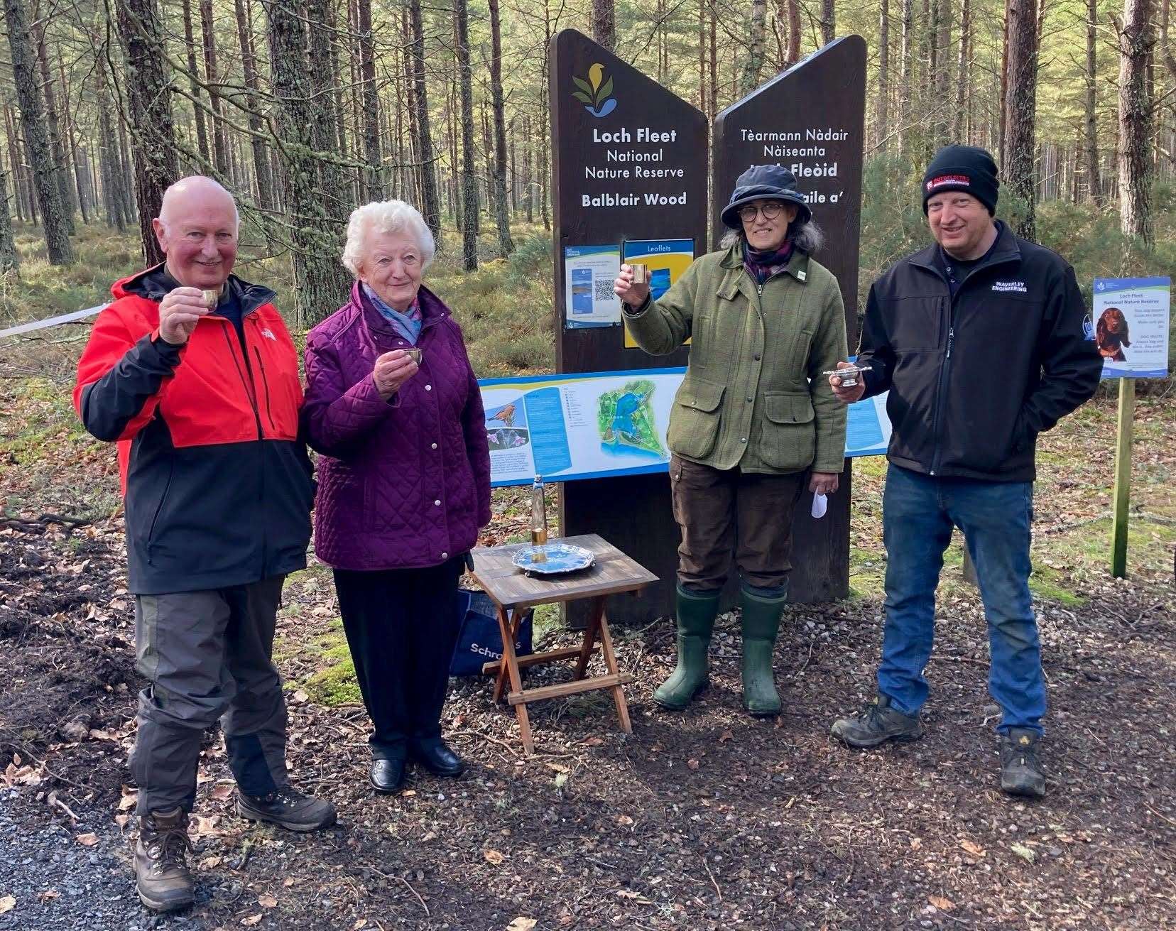 Raising their glasses in a toast to the completion of the path project are, from left, Iain Miller, Sally Gordon, Henrietta Marriott and Richard Gordon of Waverley Engineering.