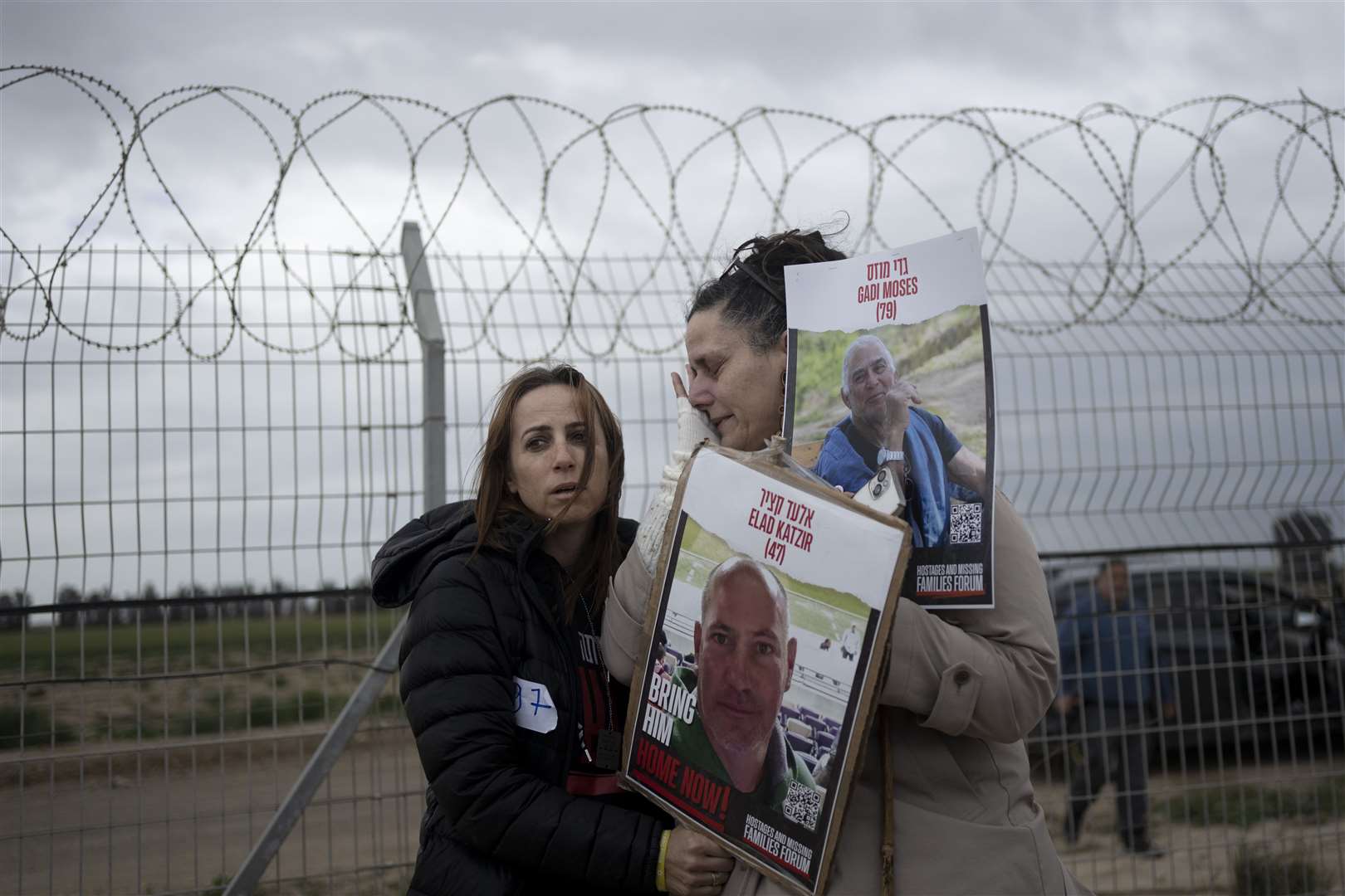 Maya Palty comforts Efrat Machikawa, who both have relatives in Hamas captivity in the Gaza Strip (Maya Alleruzzo/AP)