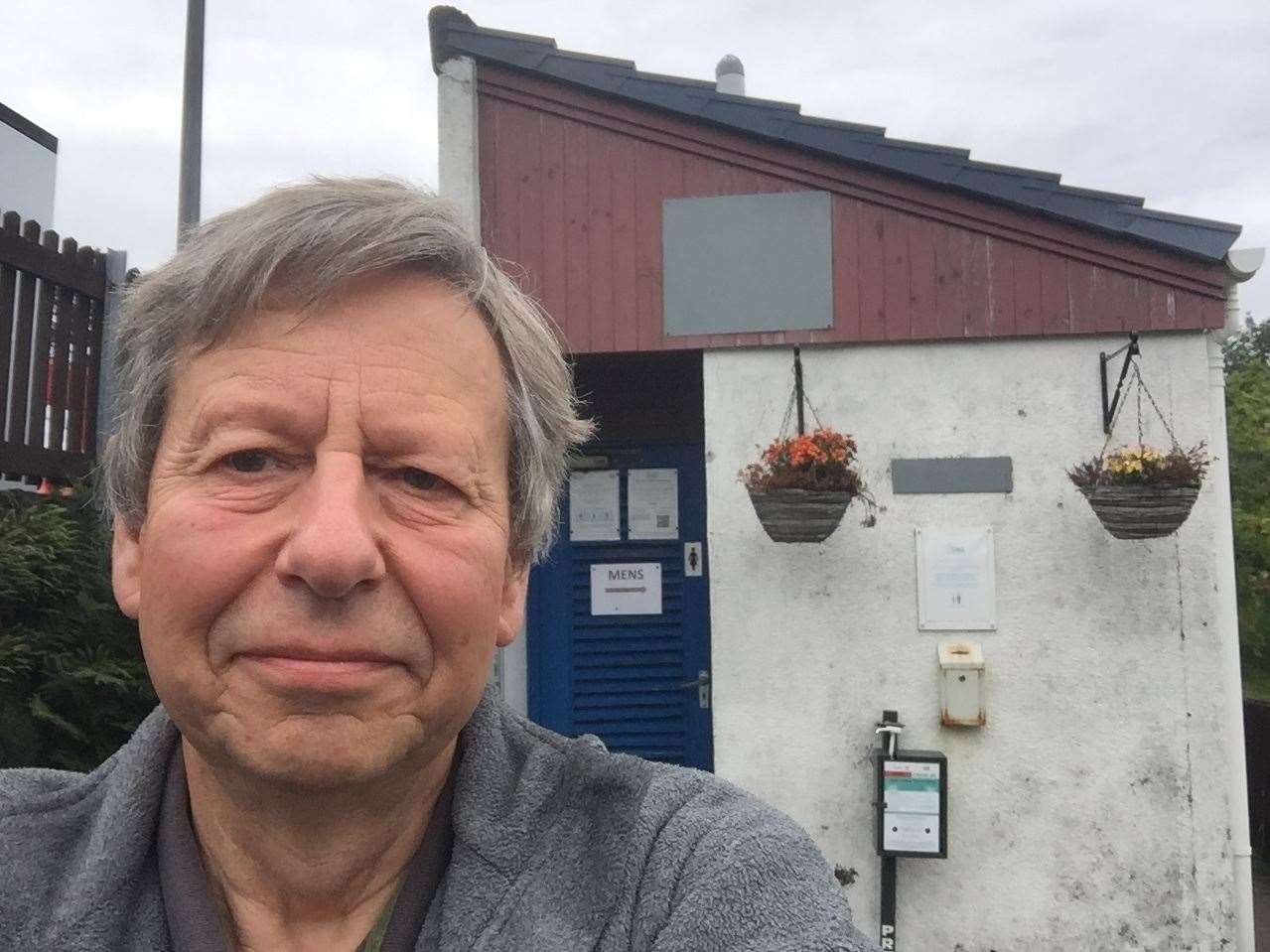 John Wood, campaigner for provision of public toilets in remoter areas, outside facilities at his home village of Poolewe