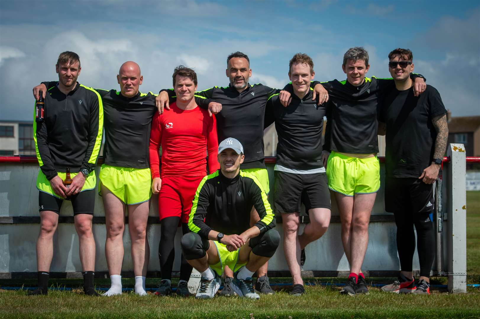 Richie Hart (centre) pictured with Steven Mackay (kneeling front) taking part in an ultra marathon.