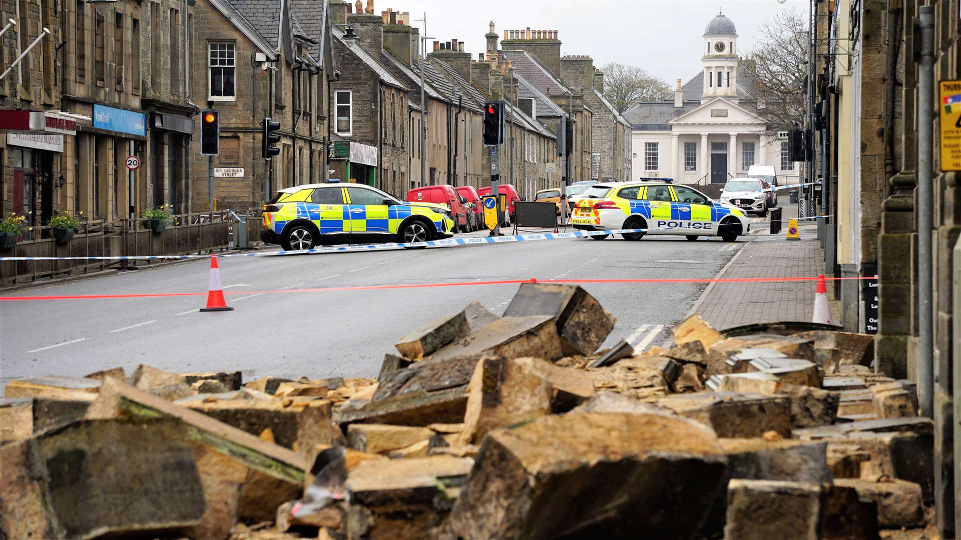 Tons of masonry collapsed onto the street from the parapet of the former Clydesdale Bank building on Traill Street in Thurso this morning. Picture: DGS