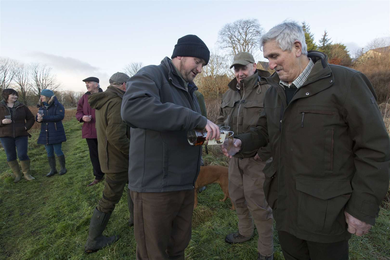 Senior ghillie Geordie Doull makes sure the anglers are provided with a small dram to toast the opening of the salmon season. Picture: Robert MacDonald / Northern Studios