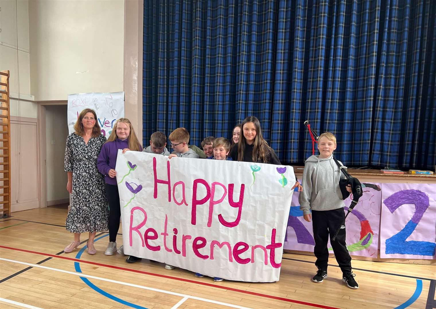 Helmsdale pupils made a huge poster saying "Happy Retirement".