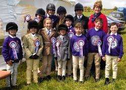 Rosettes proudly on display among some of those who took part in Sutherland Pony Club’s annual summer show.