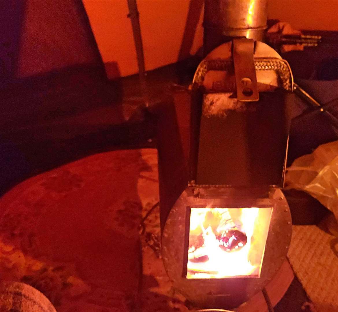 A woodburning stove heats the tent up quickly.