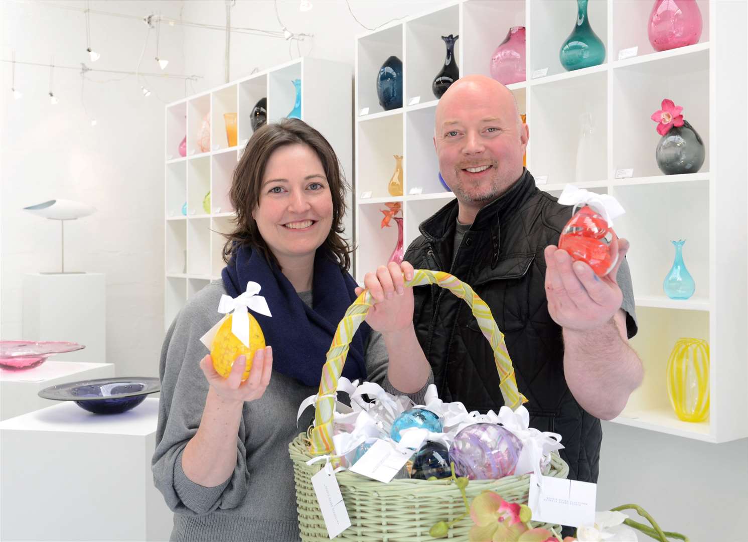 Glasstorm owners and artists Nichola Burns and Brodie Nairn with some of their popular glass Easter eggs. Proof that they don't put all their artistic eggs in one basket comes with today's Sotheby's auction which showcases some one-off high value pieces for the luxury whisky trade. Picture: Alison White.