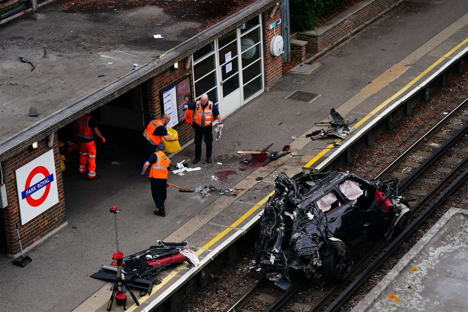 The scene of a fatal crash in west London in which a Range Rover ended up on a railway track (Victoria Jones/{PA)