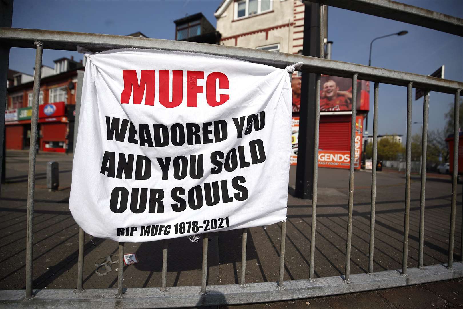 A banner left by Manchester United fans objecting to the club’s decision to join the European Super League, (PA)