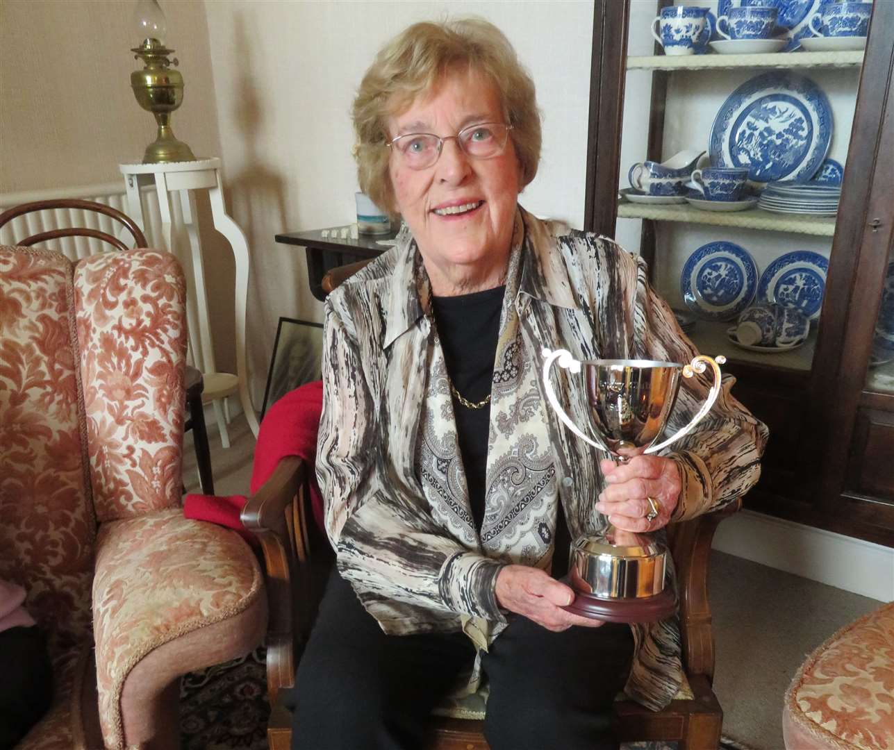 Jeanette Johnston with the trophy in memory of her husband Hugh.