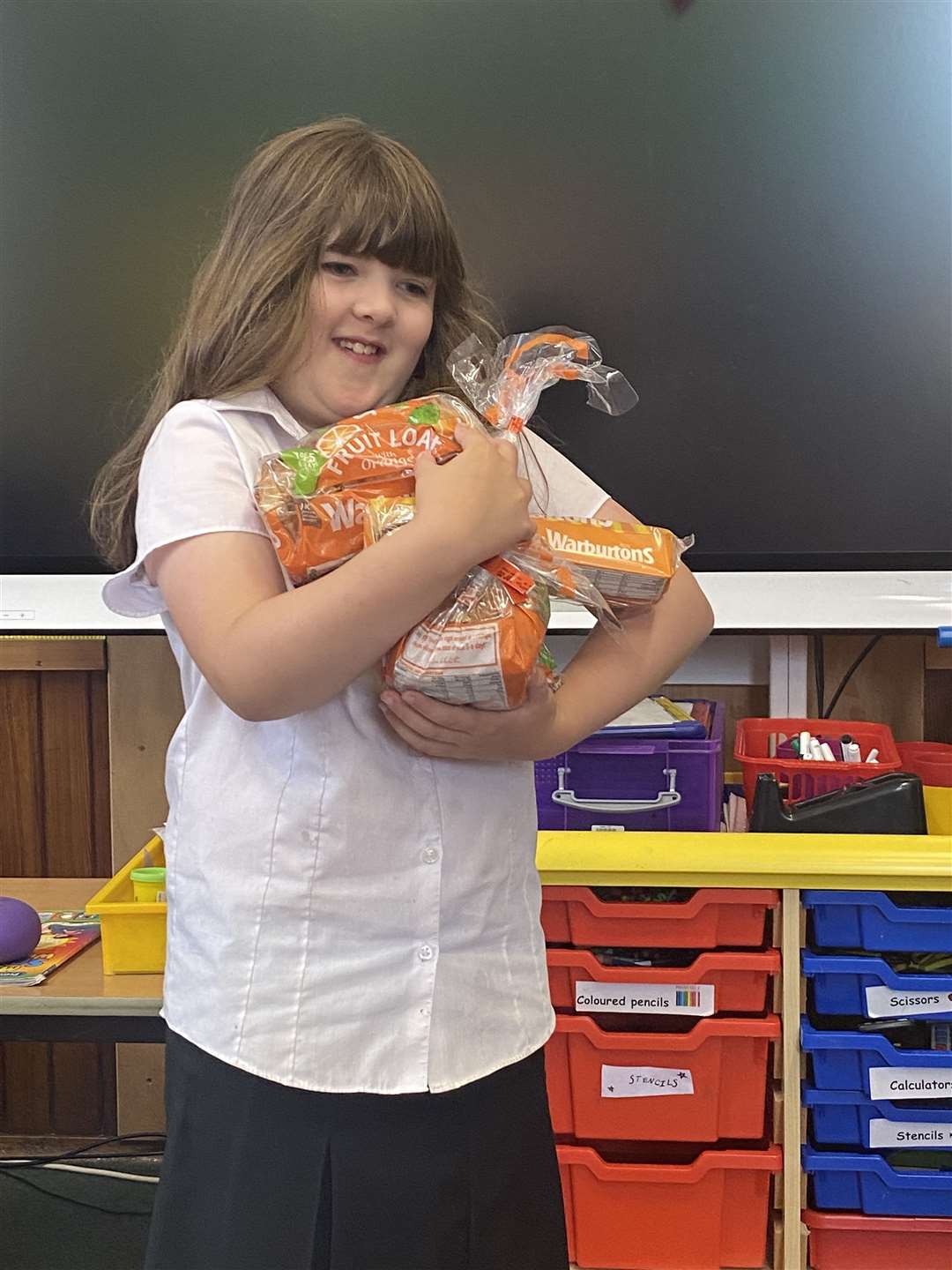 Ashleigh Johnson won a Warburtons hamper filled with baked goods and 35 goodie bags and a supermarket voucher for her class.