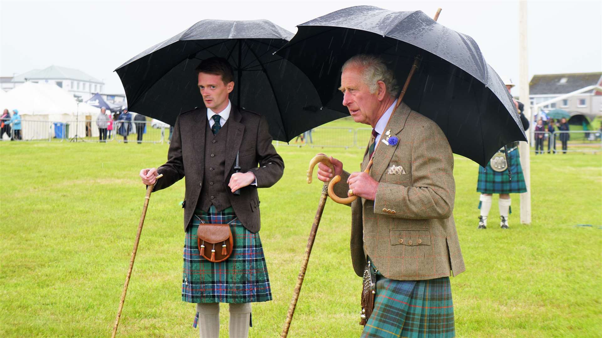 Chair of the games, Andrew Sinclair, watches as Prince Charles adjudicates at the tug of war. Picture: DGS