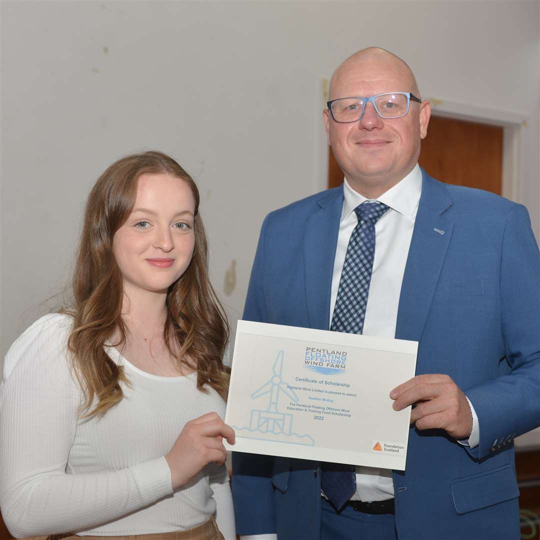 Anders Galsgaard, a senior director with the Pentland Offshore Floating Wind Farm Project, presents Heather Mackay with her scholarship. Picture: Jim A Johnston