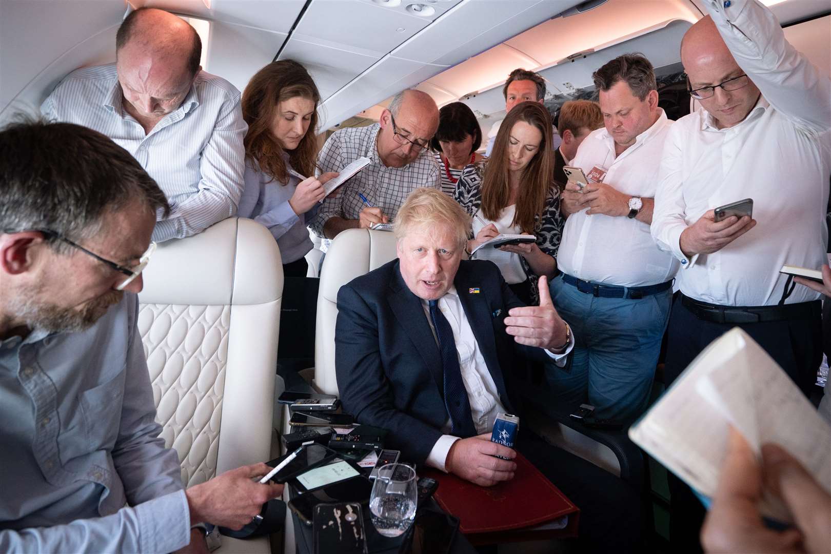 Prime Minister Boris Johnson speaks to the media on board his flight to India (Stefan Rousseau/PA)