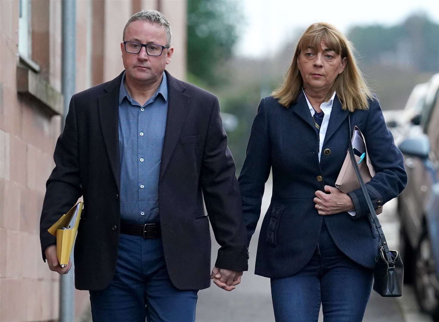 Linda and Stuart Allan, the parents of Katie Allan, arrive at the inquiry (Andrew Milligan/PA)