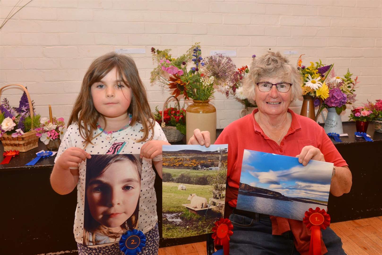 Megan Maclean and her grandmother Jean with their prizewinning photographs. Picture: Jim A Johnston