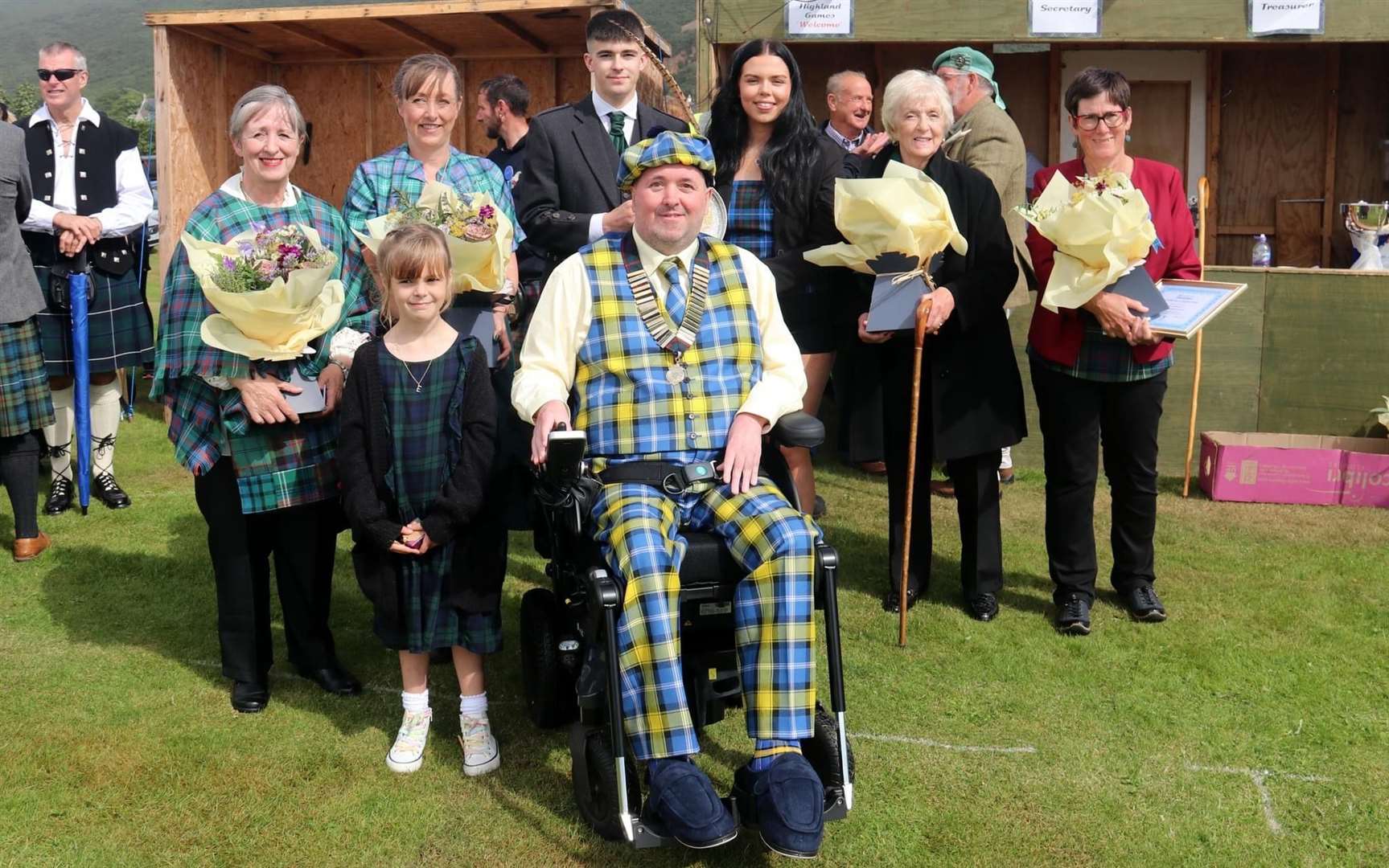 Chieftain Iain Whitehead (centre) with, from left, Edie Whitehead, Sharon Whitehead, Donnie Ross, Lorna Macrae, Christine Cowie, Fiona Sutherland and flower girl Elle Withey.