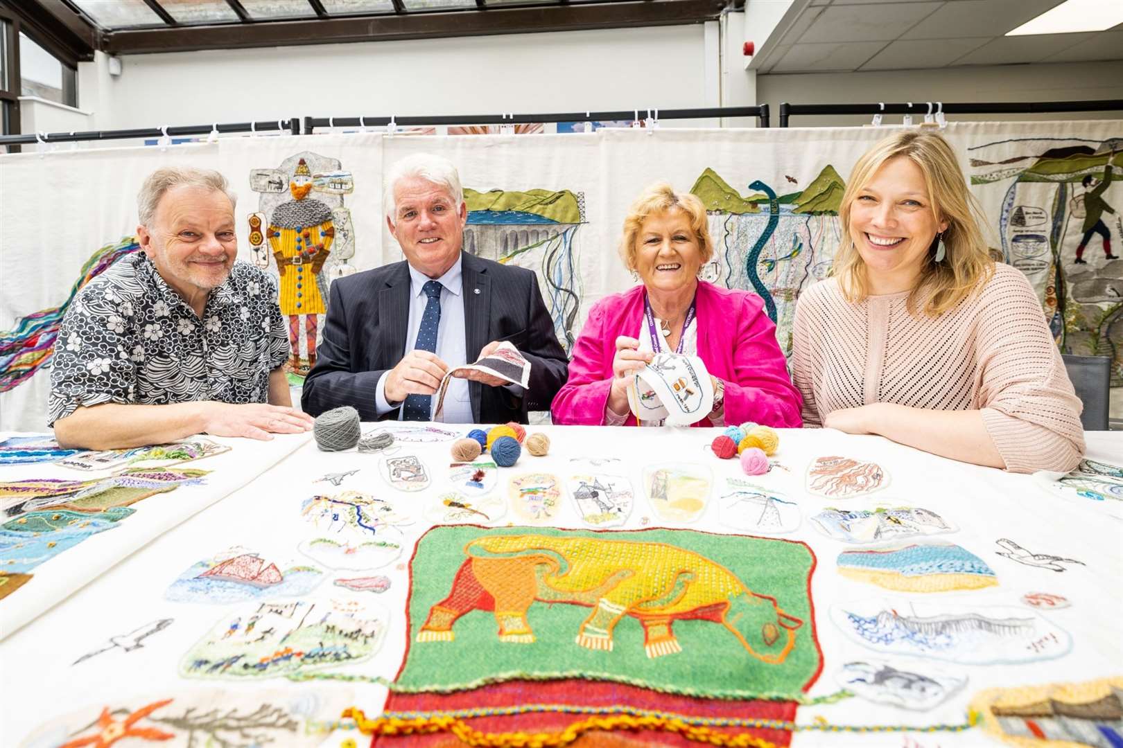 Andrew Crummy MBE Designer, Cllr Ian Brown, Kirstie Campbell Stitch Coordinator and Highland councillor Isabelle (Biz) Campbell. Picture: SOTHI/Paul Campbell.