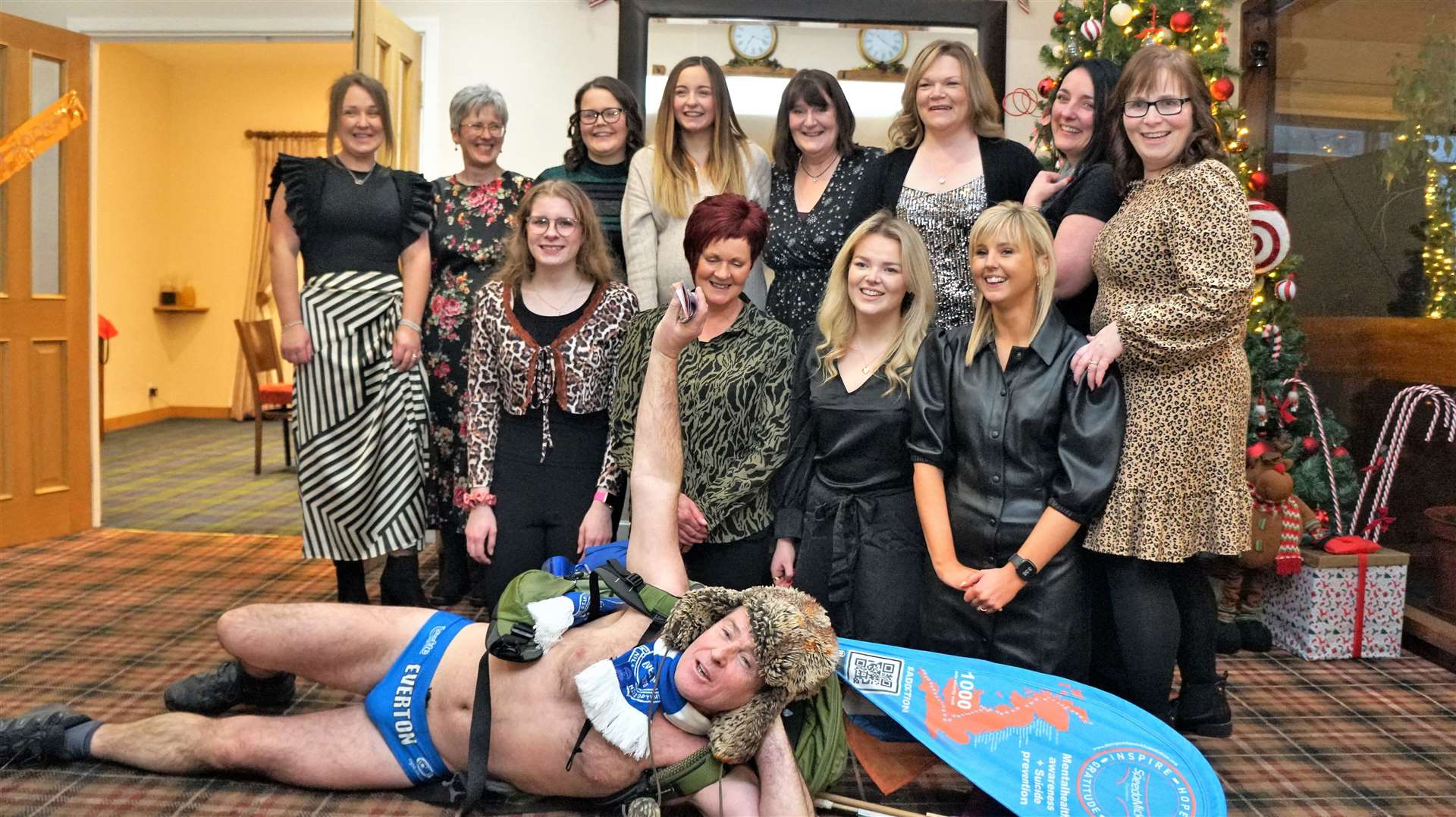 Speedo Mick poses with the ladies at the Norseman Hotel who were celebrating a pregnancy, a 60th birthday and a leaving do for one of their number. Picture: DGS