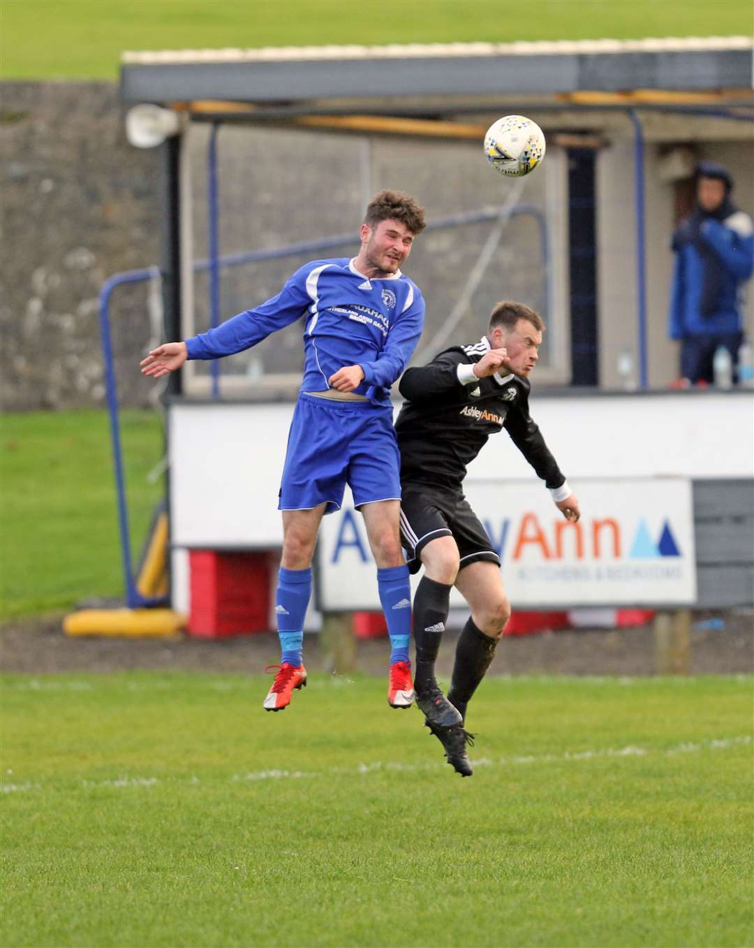 Allan Munro is beaten in the air by Golspie winger Conor Cormack. Picture: James Gunn