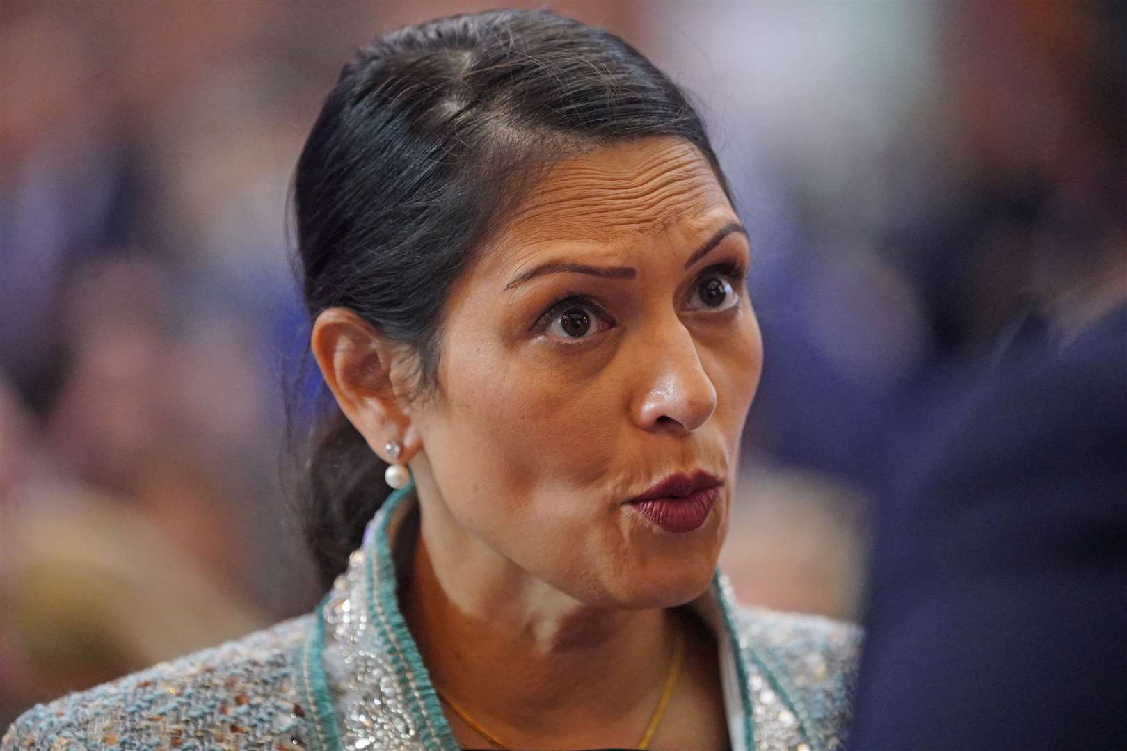 Former home secretary Dame Priti Patel urged the Government to implement measures set-out in the Nationality and Borders Act to safeguard children (Victoria Jones/PA)