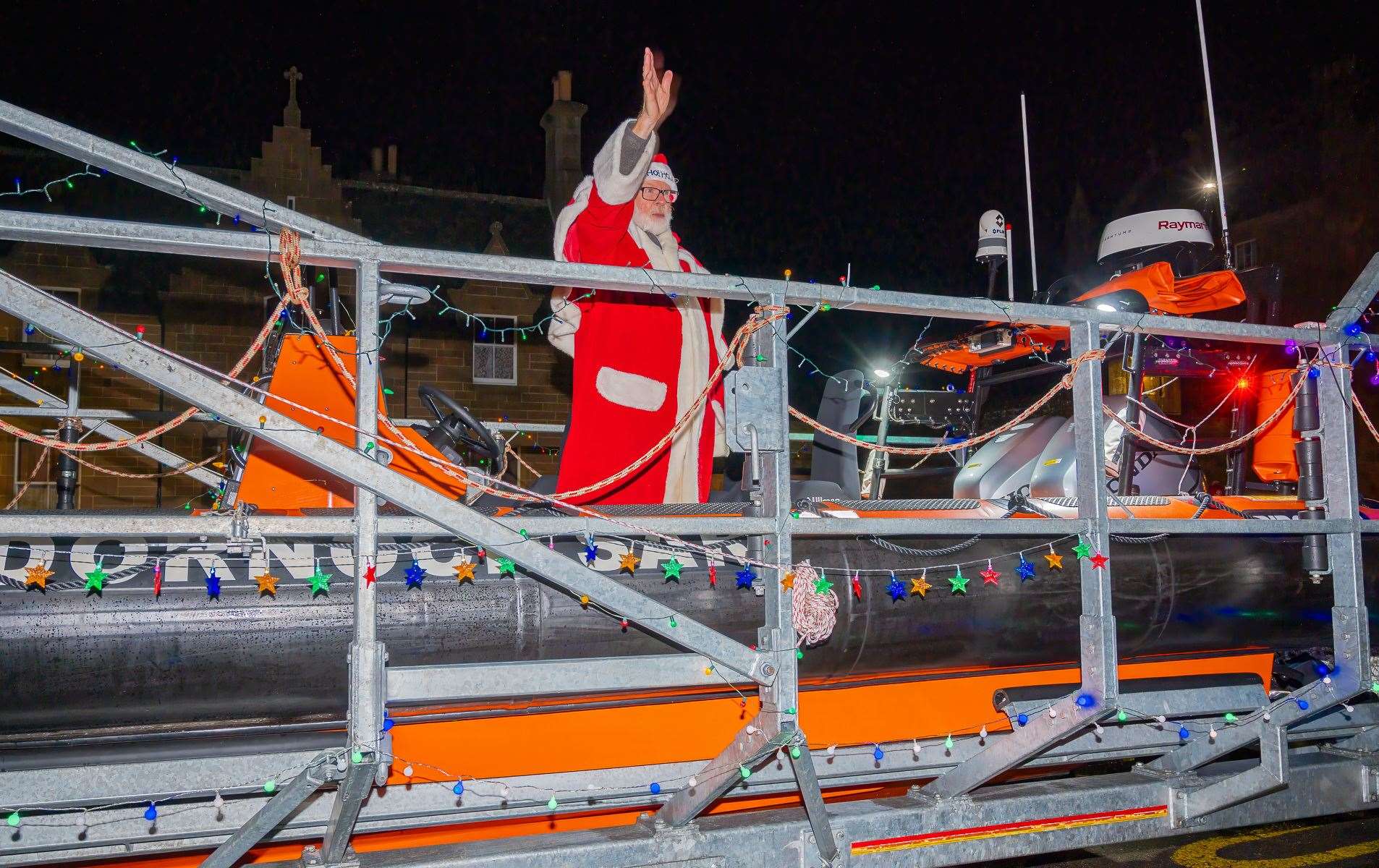 A wave from Santa aboard ESRA's new lifeboat, Wildland. Picture:Andy Kirby