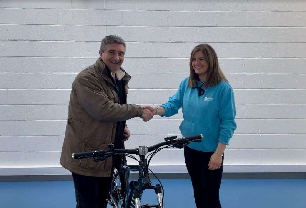 Gary Laird of Alness was delighted to be chosen winner of a new e-bike.