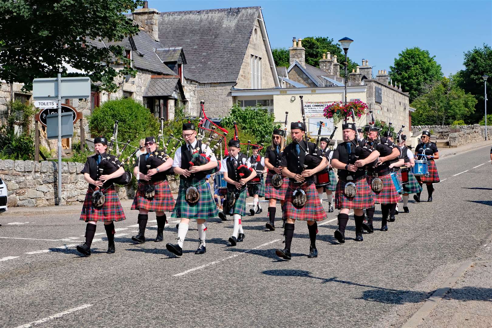 Sutherland Schools Pipe Band and Sutherland Caledonian Pipe Band played at the opening day of Lairg Gala Week.