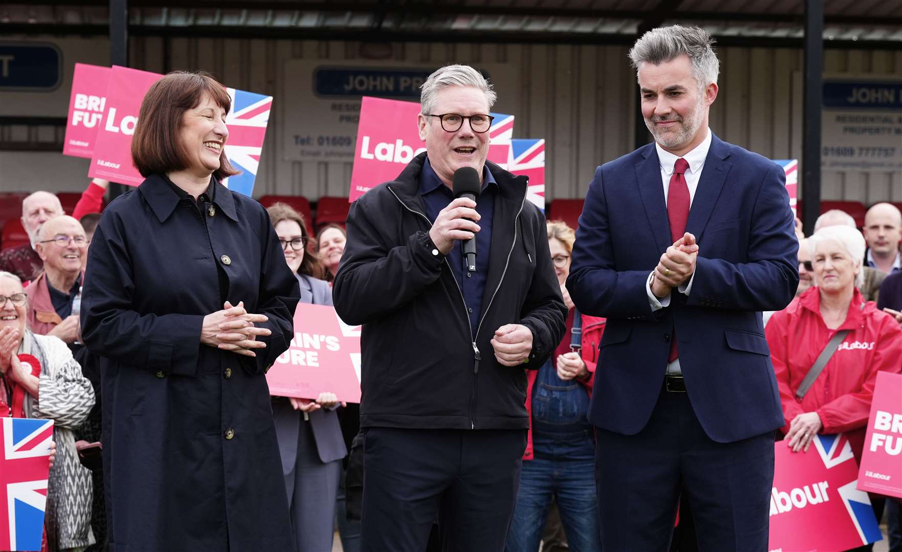 Labour Party leader Sir Keir Starmer and shadow chancellor Rachel Reeves celebrate with David Skaith at Northallerton Town Football Club (Owen Humphreys/PA)