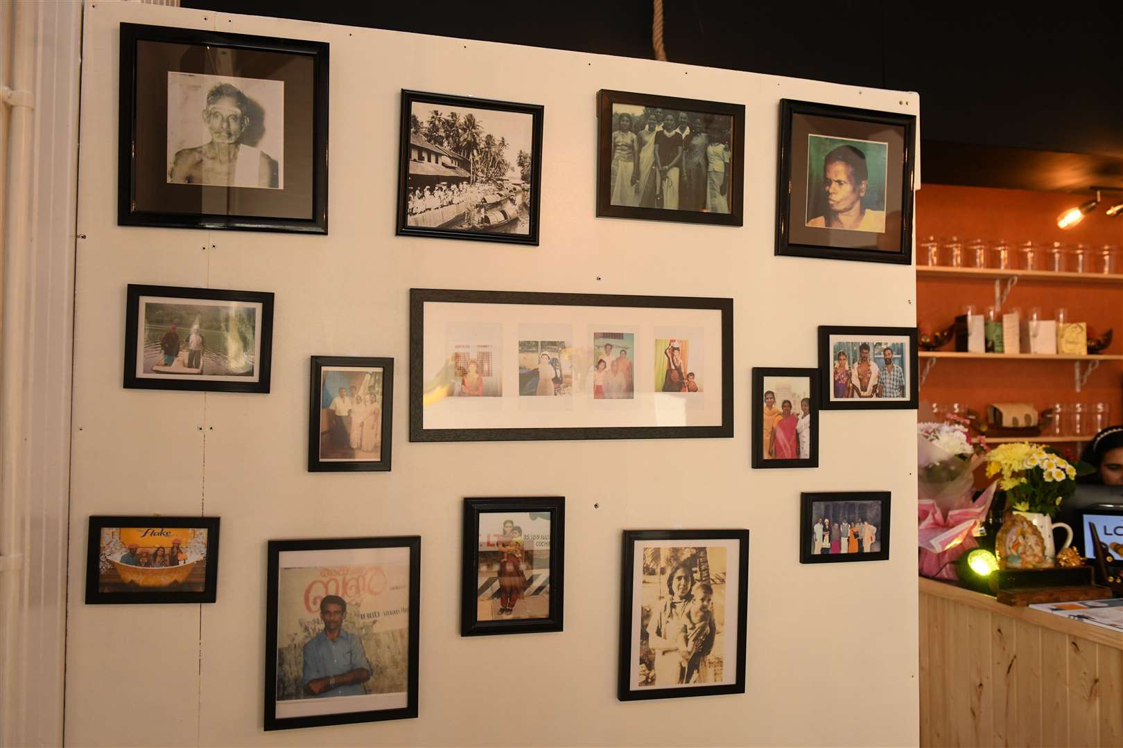 Family photos on the wall of Love Dosa. Picture: James Mackenzie.