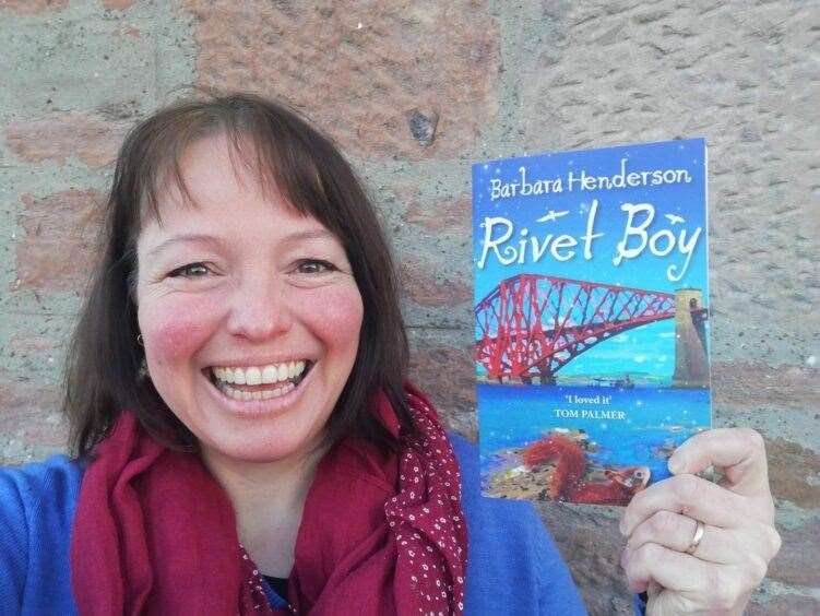 Author Barbara Henderson with her new book.