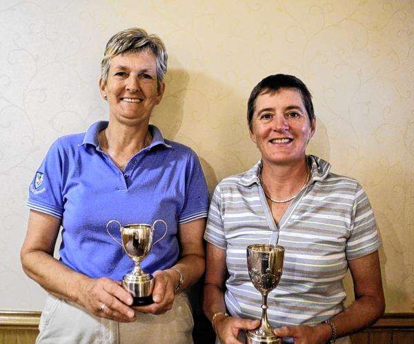 Alison Bartlett (right) and Margaret Ross with their trophies.