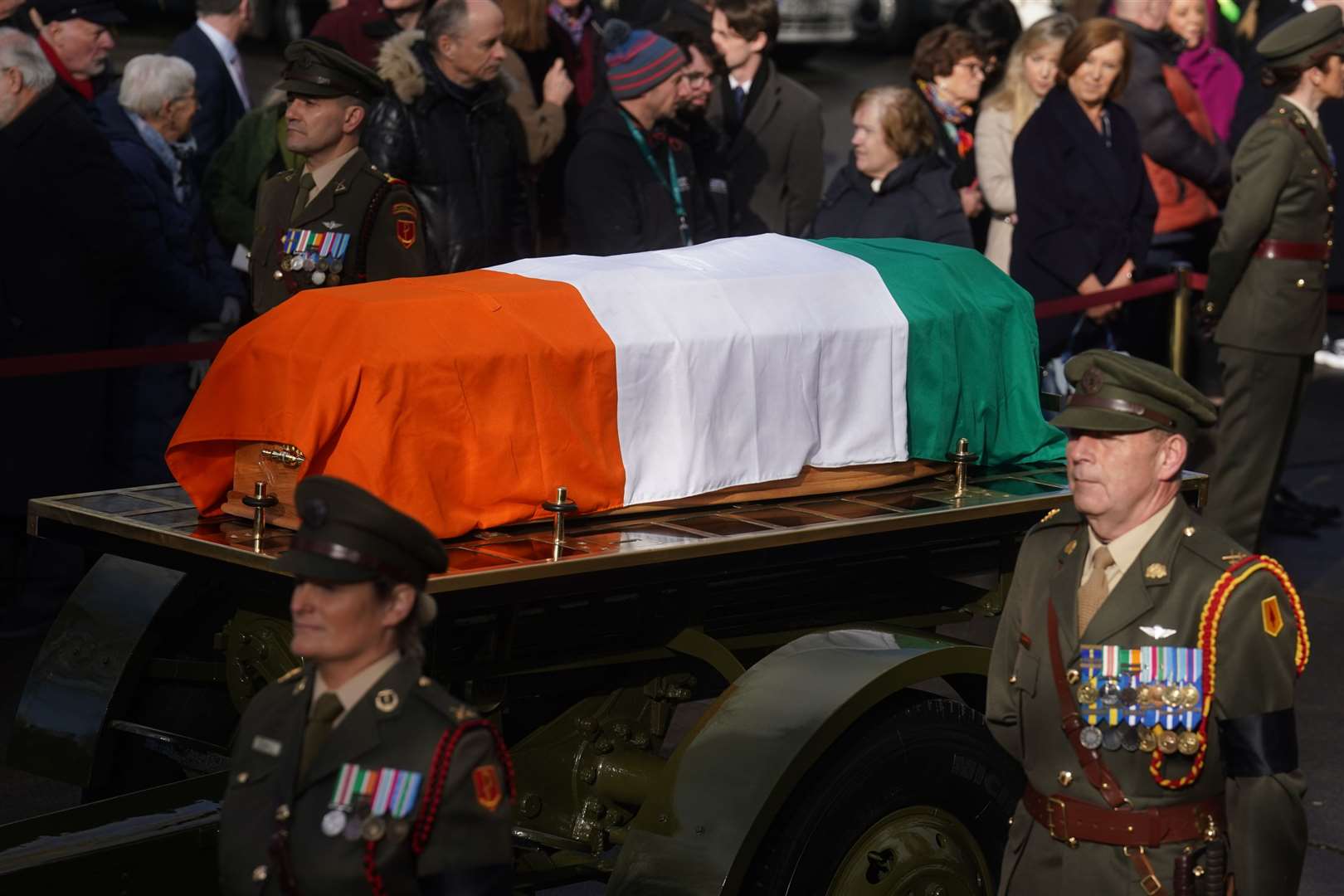 The coffin of former taoiseach John Bruton is carried on a gun carriage following his state funeral (Brian Lawless/PA)
