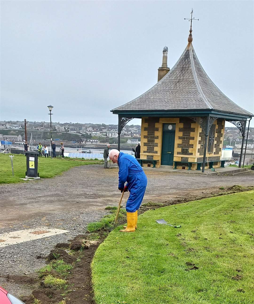 Straightening a verge near the Pilot House in readiness for Saturday's memorial event.