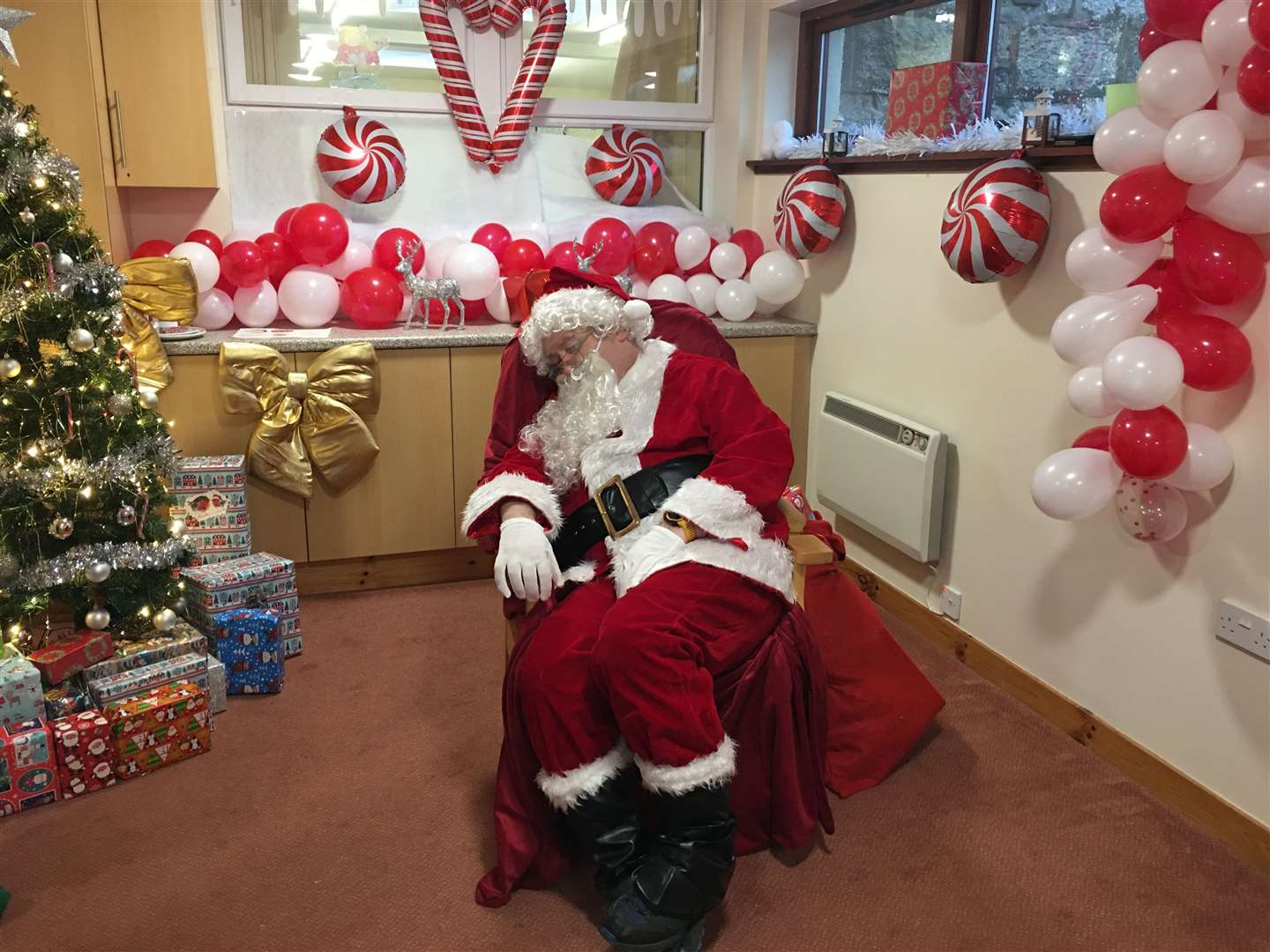 It's a busy time of year for Santa who had to take a little rest after spending all afternoon in his grotto talking to lots of children at Lairg Winterfest.