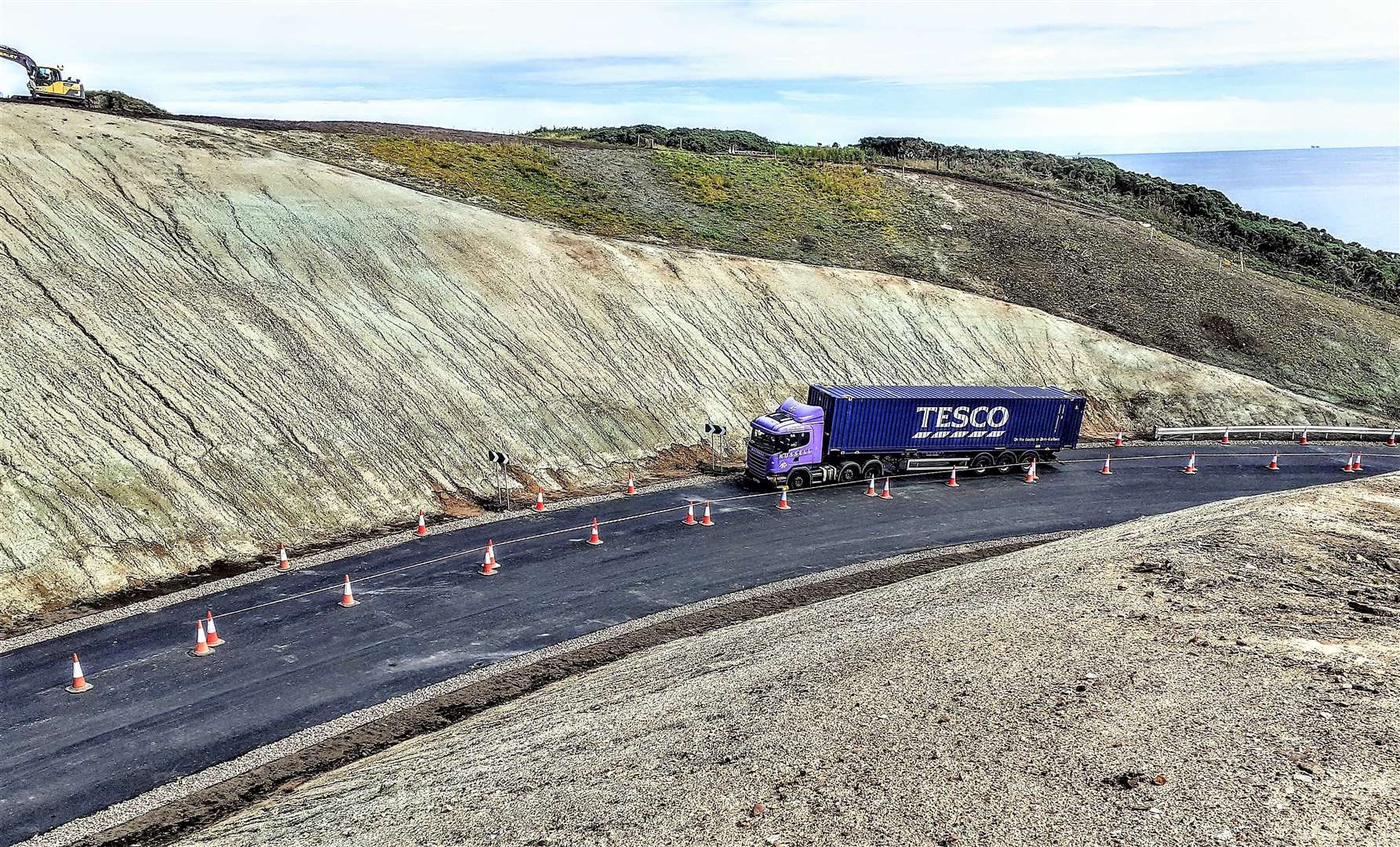 A lorry making its way up the A9 last month after the new carriageway at Berriedale began operating under a traffic light system. Picture: Derek Bremner