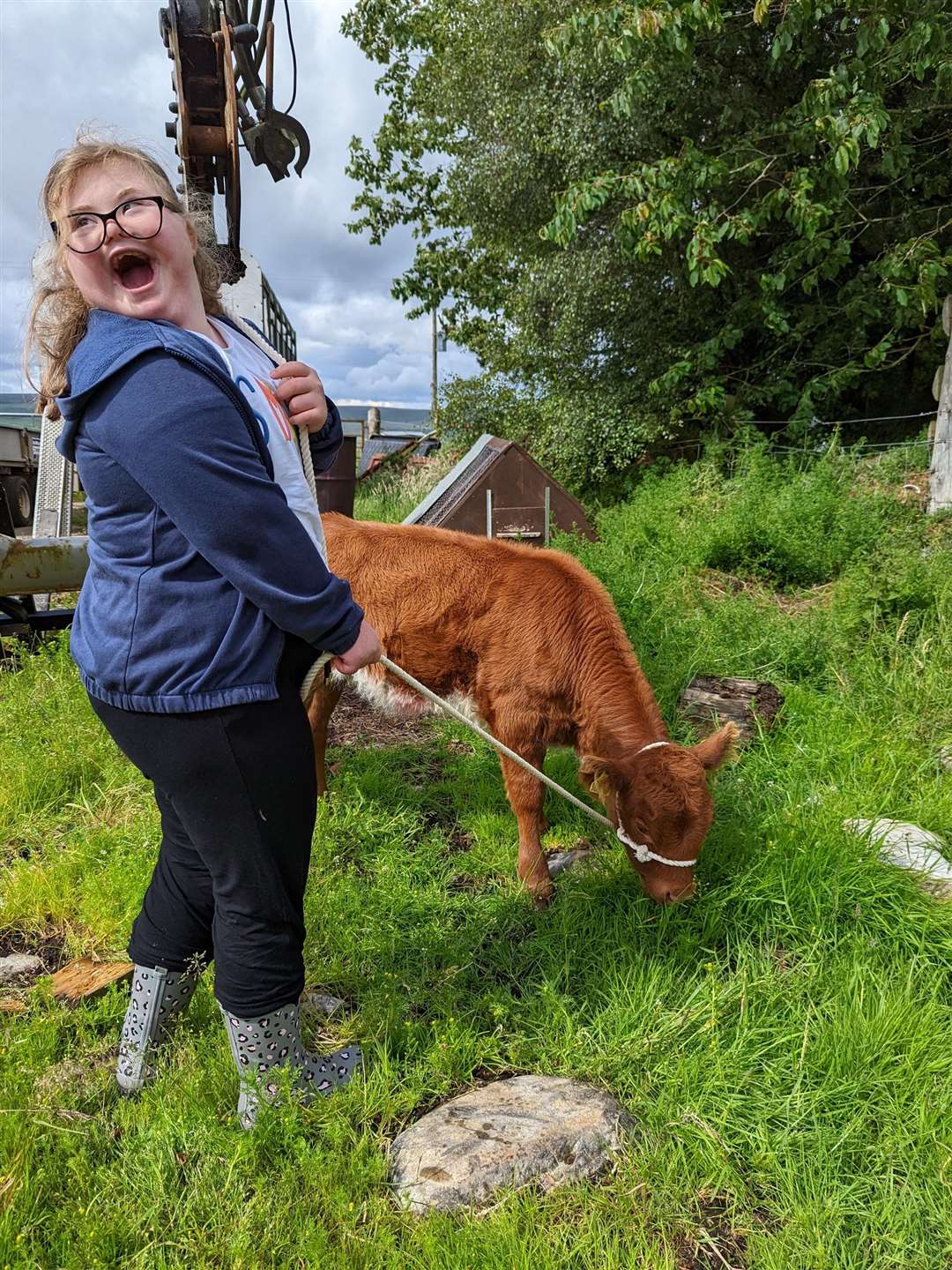 Young Kinlochbervie High School student Brianna Morrison, who has been attending Lochview Rural Training since August 2021, shows her delight at being in charge of a calf.