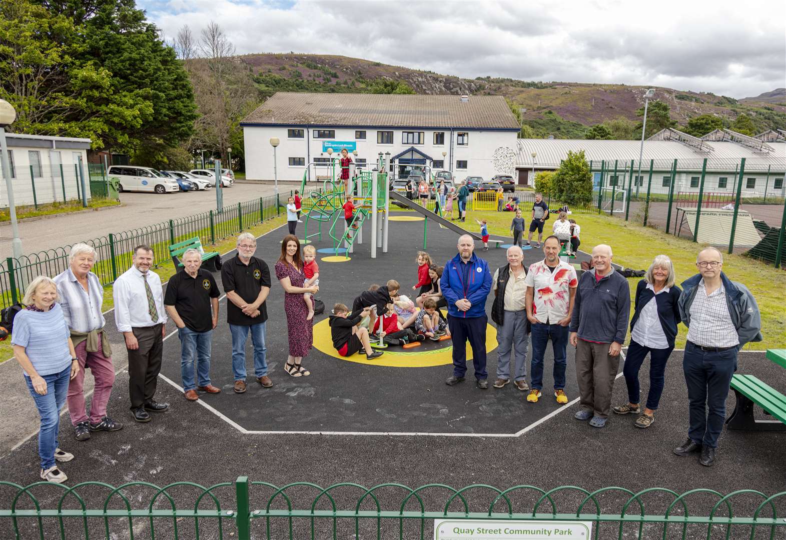 The new Ullapool play park, with the many locals who contributed to the project.