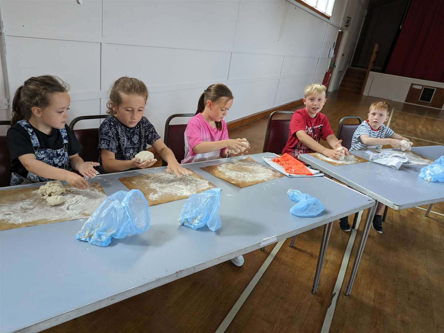Youngsters enjoyed making pizza pinwheels and sticky popcorn squares at the kids' cookery session. From left: Violet Stevenson, Ella MacLean, Ruby Stevenson, Jack and Fraser Livings.