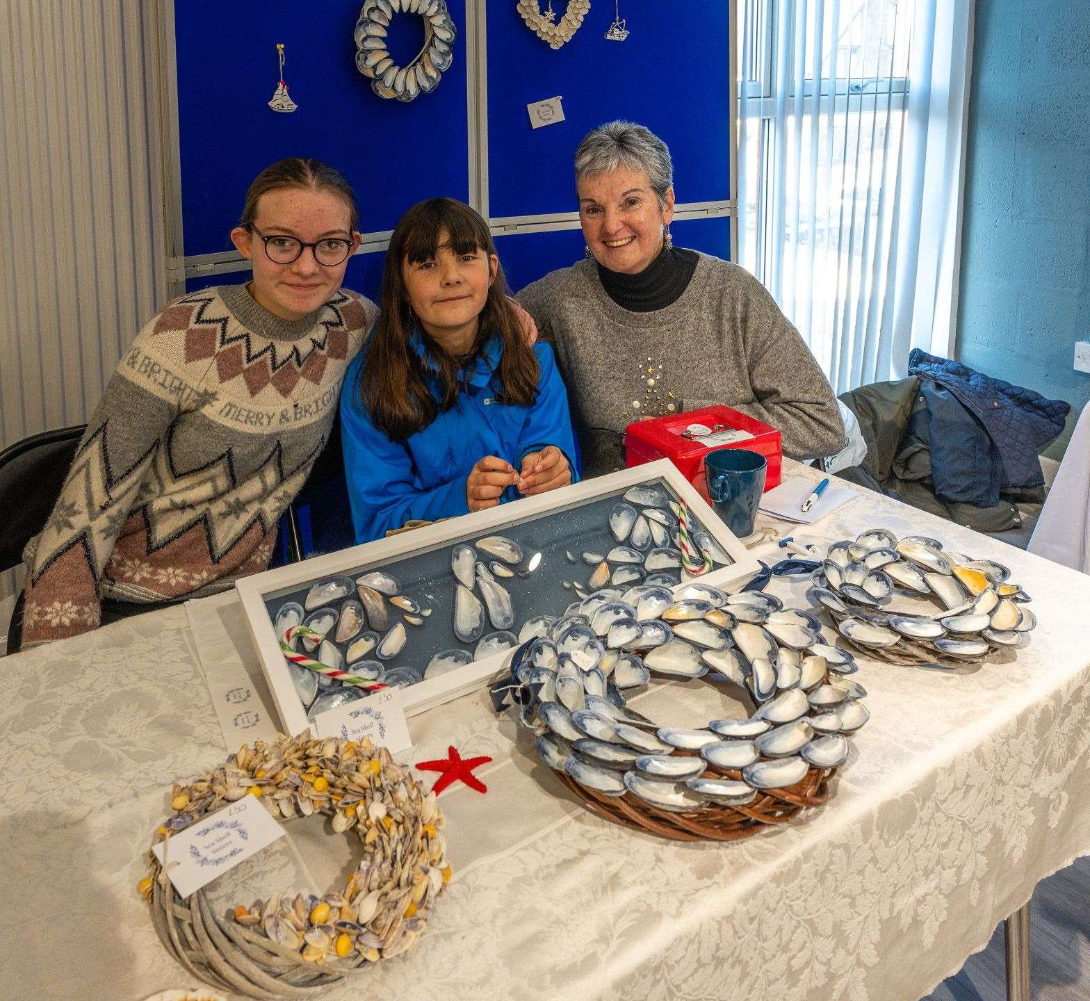 The Sea Shell Sisters, Faye and Robyn Holder with their granny Eileen MacRae. The sisters collect shells from Dornoch beach and turn them into beautiful creations. Picture Andy Kirby