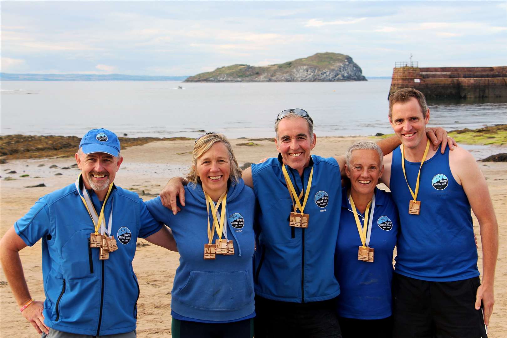 The club came away with four medals: a bronze in men’s 45+; two silvers in women’s 45+ and mixed decades; and a gold in the mixed open. From left, Ian Sutherland, Becky Shaw, Ronald Mackay, Carene Ross and Neil Jacobs. Picture: David Richardson