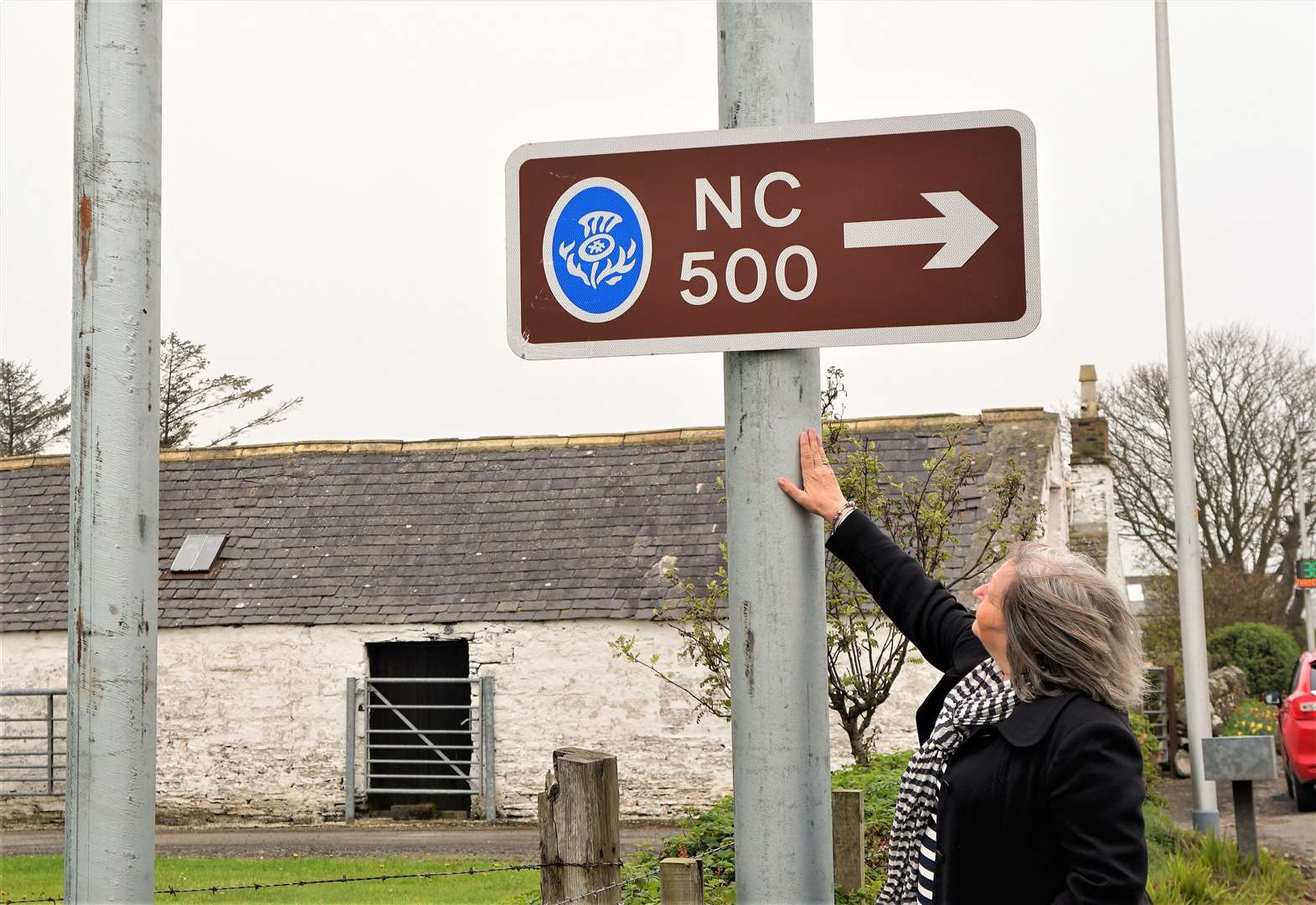 NC500 signpost finally re-erected at Reiss – residents nightmare at an end thanks to efforts of local councillor
