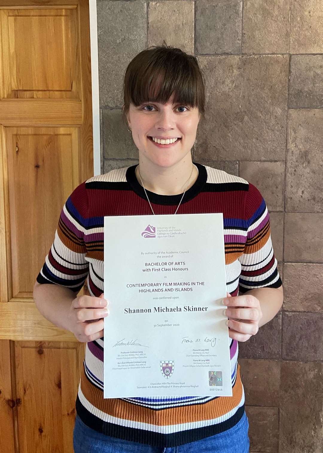 Shannon Skinner with her degree certificate.