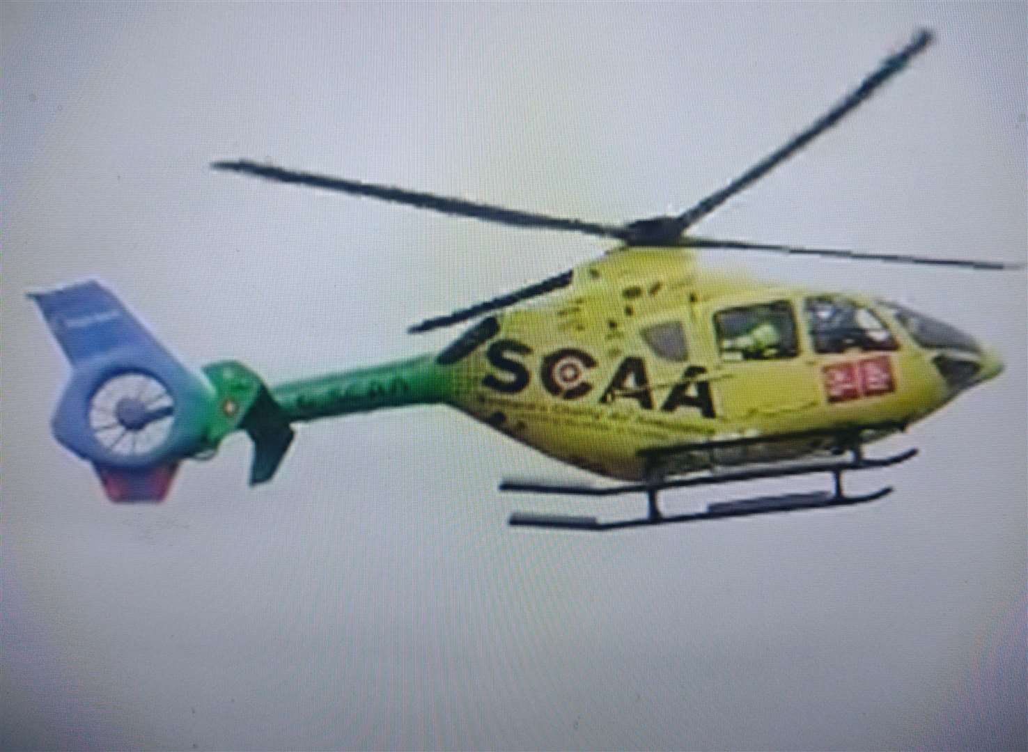 An Aberdeen-based chairty helimed in action in rough weather